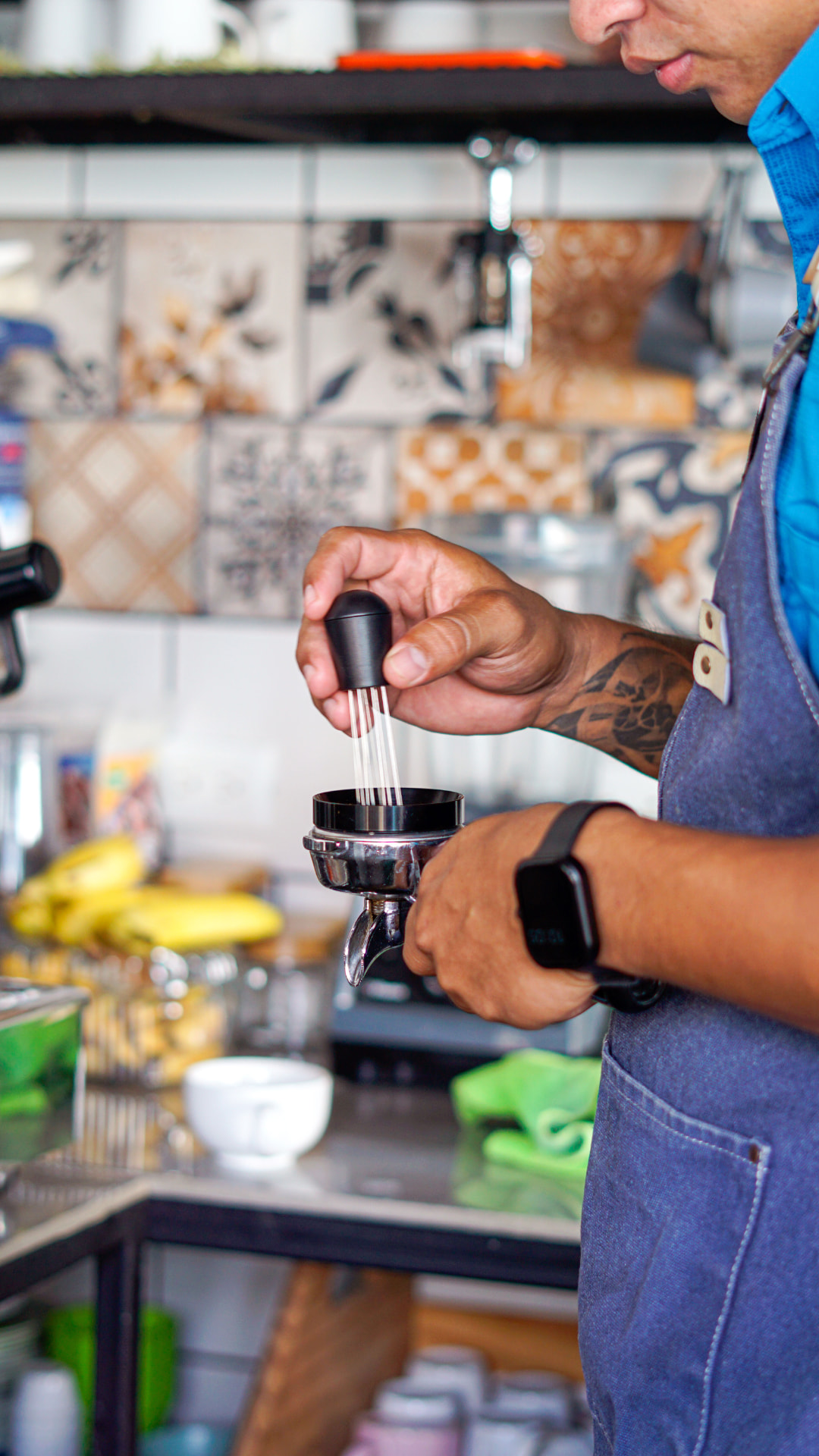 Barista preparing espresso at Paradise Grille