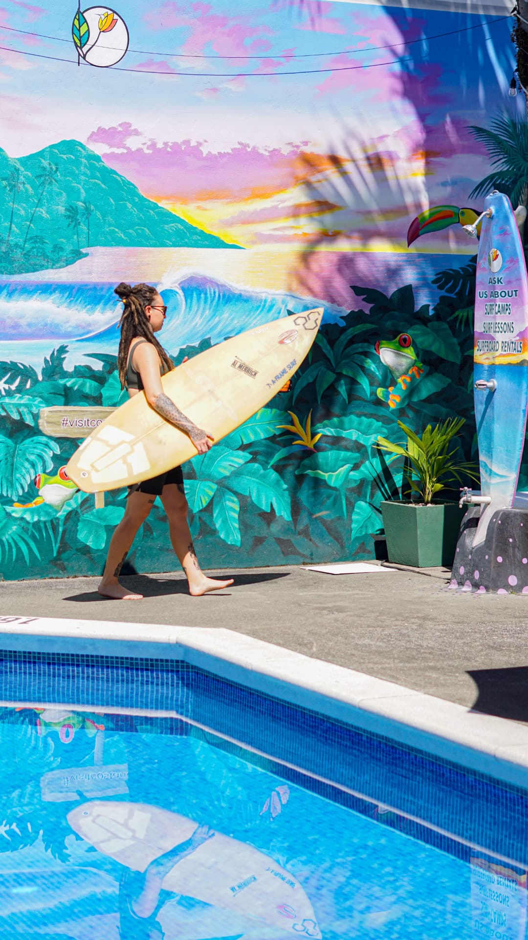 Surf mural above the water